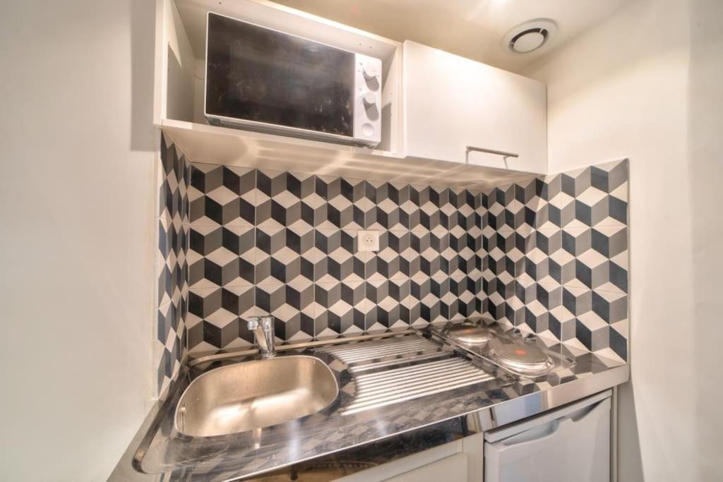 Bel Appartement Au Coeur De Montmartre Paris Luaran gambar