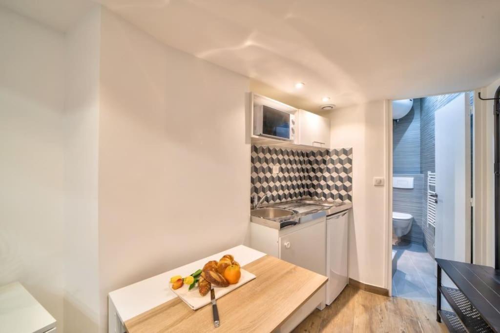 Bel Appartement Au Coeur De Montmartre Paris Luaran gambar